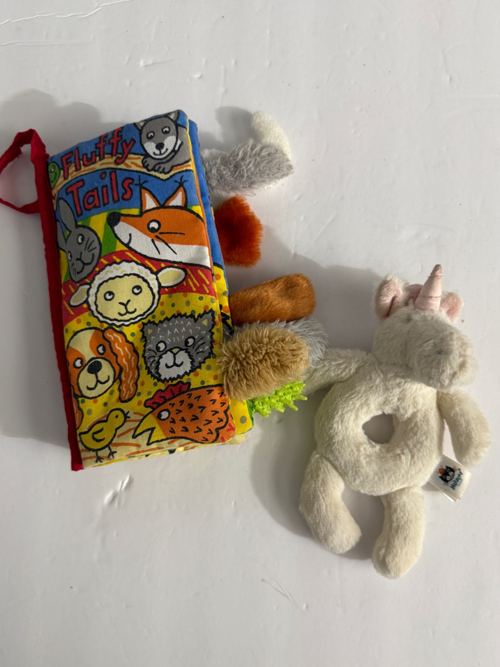 Jellycat Unicorn rattle and fluffy tails book set
